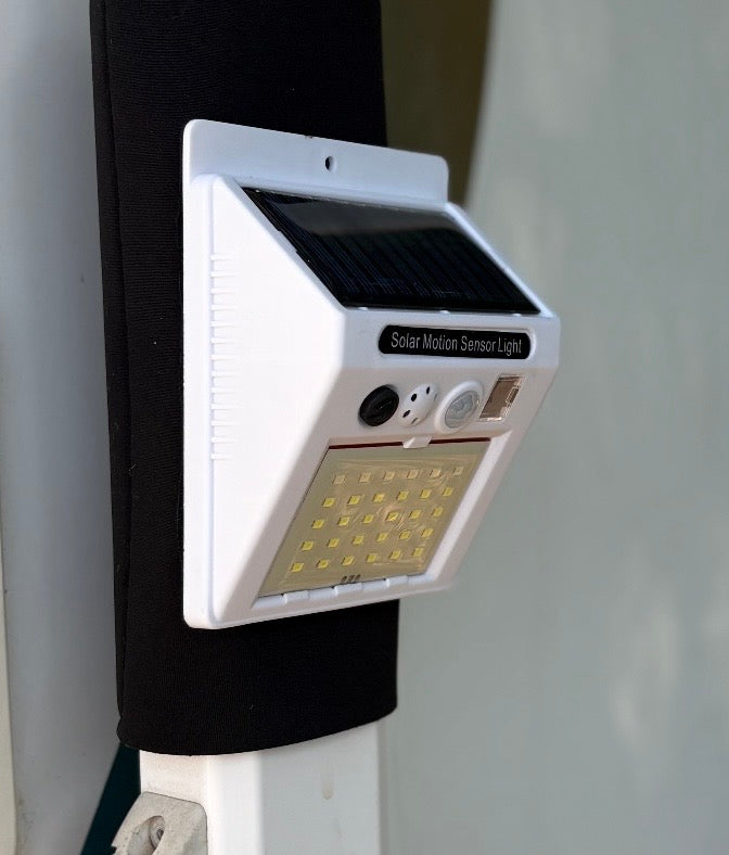 MULTI— USE AWNING STRAP - SOLAR LIGHT AND INTRUDER ALARM