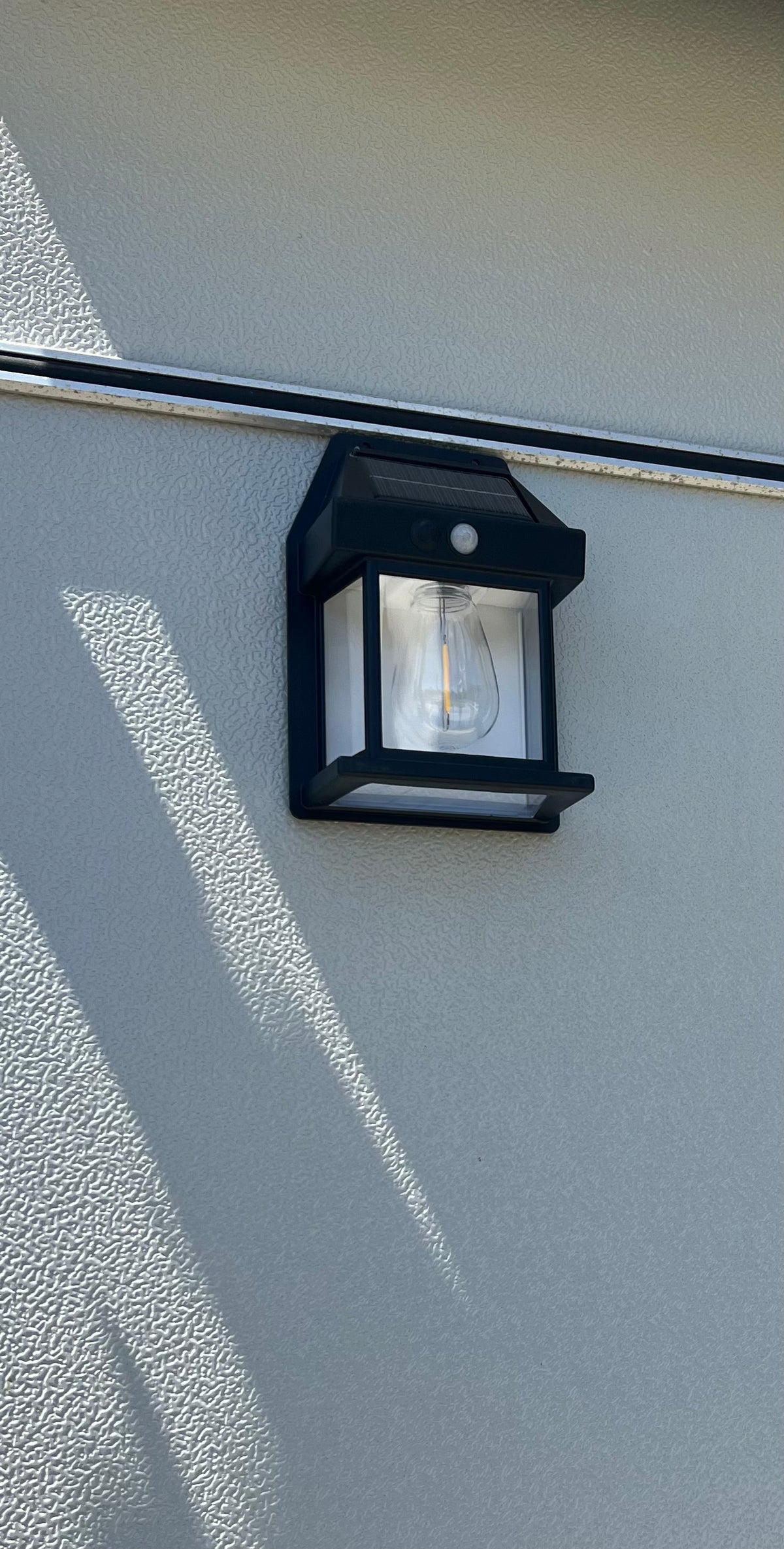 SOLAR POWERED OUTDOOR LIGHT