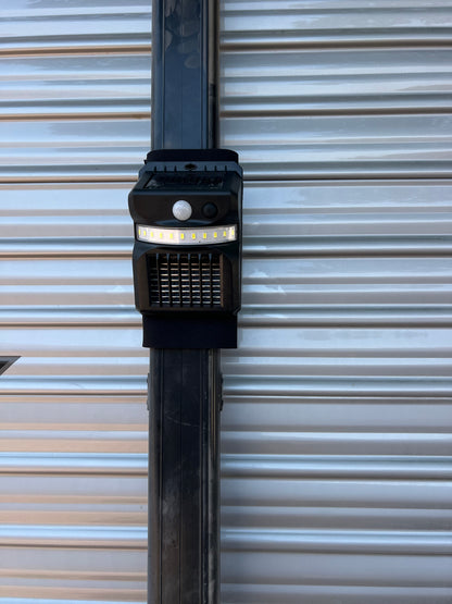 SOLAR POWERED CARAVAN/RV LIGHT/MOZZIE/ZAPPER ATTACHES TO AWNING STRAP PREVENTS ACCIDENTAL AWNING OPENING IN TRANSIT.